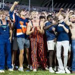 Virginia fans engulf FSU football players while storming field