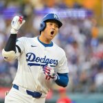 Dodgers clobber Reds and are already dreaming of Philly