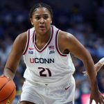 No. 1 UConn routs Florida State after raising NCAA championship banner